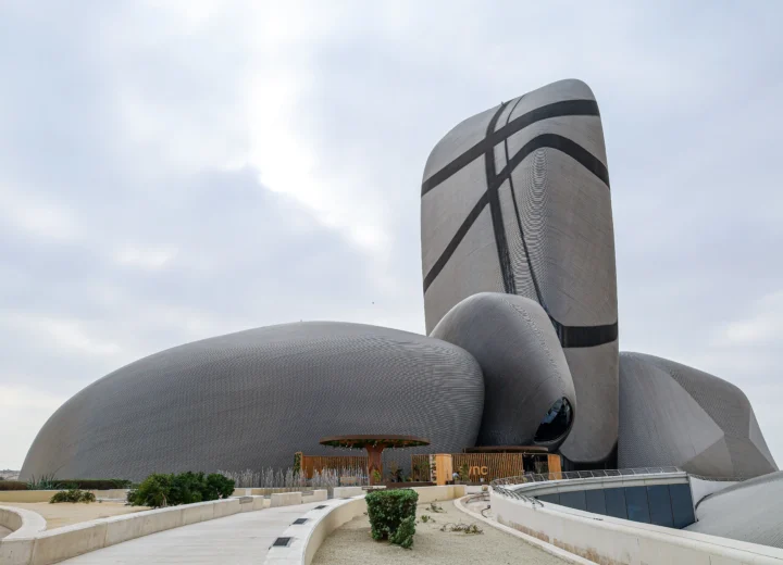 a large building with curved lines with Auditorio de Tenerife in the background